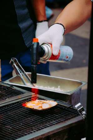Chef prepares national food on Seoul streetの写真素材