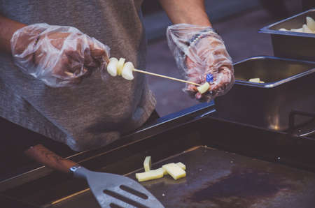 Chef prepares national food on Seoul streetの写真素材