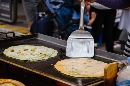Chef prepares national food on Seoul street