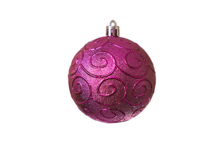 Christmas purple toy with spiral patterns for decoration on a white background, isolated, soft focusの写真素材