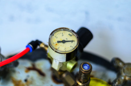 This image shows a detailed view of a pressure gauge, highlighting its design and functionalityの写真素材