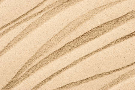 Diagonal lines and texture on sand.の写真素材