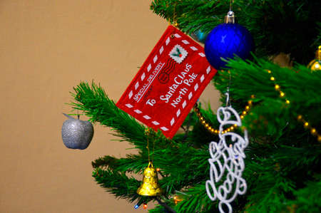 letter for Santa on a Christmas tree. Christmas tree toy in the form of a letter for Santa Clausの写真素材