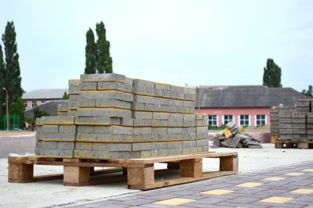 wooden pallet with paving slabs during landscaping workの写真素材