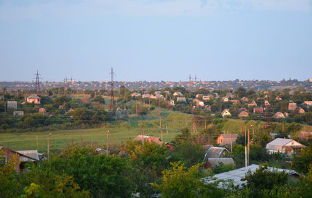 top view of a small village with private houses. the houses are painted orange because of the rays...