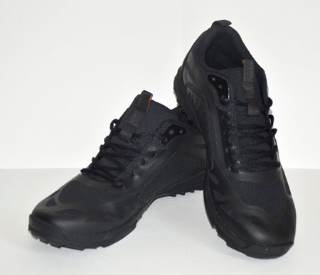 black sneakers on a white background. Sports shoes. Casual shoes for sports and walking. youth style. Shoes for fitness, running, yogaの写真素材