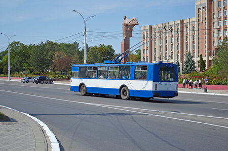 Tiraspol, Transnistria - August 31, 2022: old Soviet trolleybus on the street of the city of Tiraspol. public transport for transporting passengers. electric transport and environmental concernsのeditorial素材