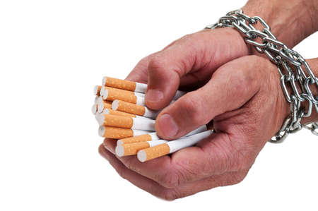 man hands with cigarette isolated on a white backgroundの写真素材