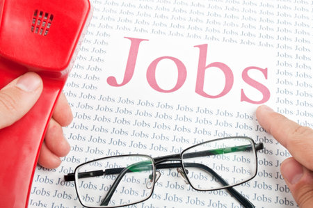 man looking for a job by telephoneの写真素材