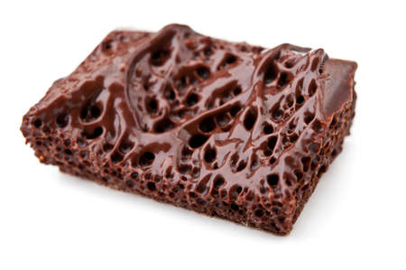 Closeup of melted chocolate isolated on a white backgroundの写真素材