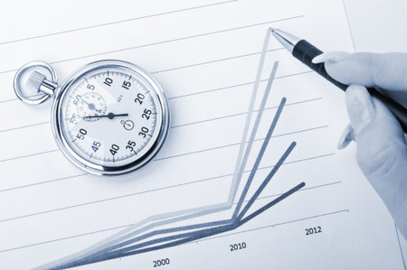 business woman points to sales growth at the company