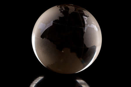 glass global symbol isolated on a black backgroundの写真素材