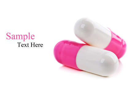 closeup of two ping pills isolated on a white backgroundの写真素材