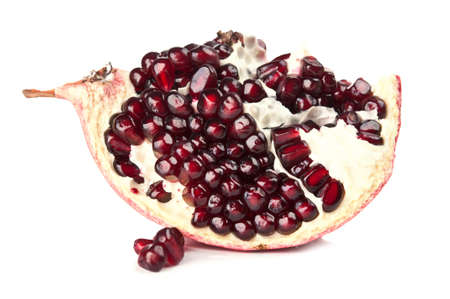 closeup of fresh pomegranate seeds on a backgroundの写真素材