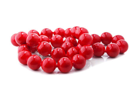 red beads isolated on a white backgroundの写真素材