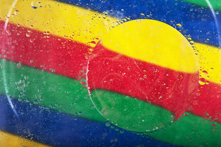 closeup of water bubbles on a color backgroundの写真素材