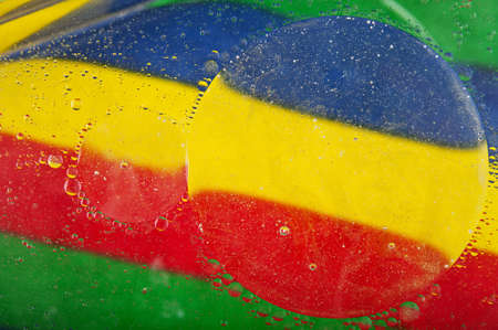 macro photo of water bubbles on a color backgroundの写真素材