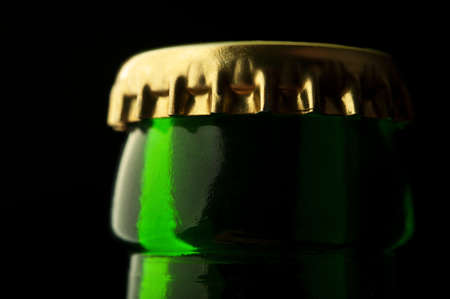 closeup of beer bottle on black backgroundの写真素材