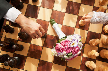 Chess battle between the bride and groomの写真素材