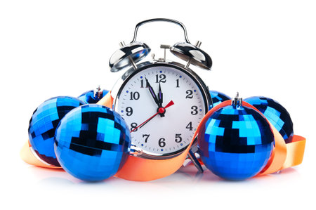 clock and christmas balls isolated on white