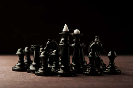 chess pieces on a wooden tableの写真素材