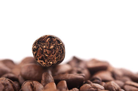 cigar and coffee beans isolated on whiteの写真素材