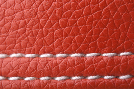 closeup of red leather backgroundの写真素材