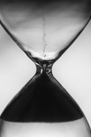 Closeup of hourglass clock background