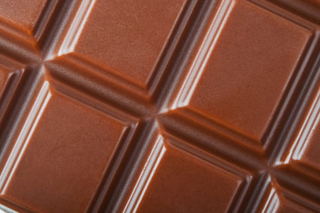 Closeup of chocolate bars on backgroundの写真素材