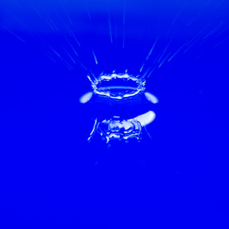 water splash on blue backgroundの写真素材