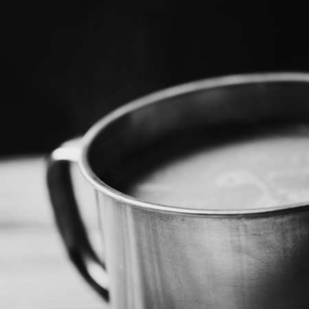 cup of coffee on black backgroundの写真素材