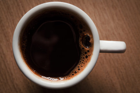 hot cup of coffee on background