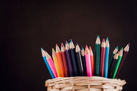 Closeup of colored pencils on background