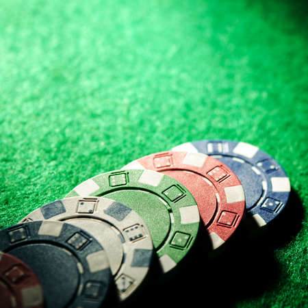 poker chips on a tableの写真素材