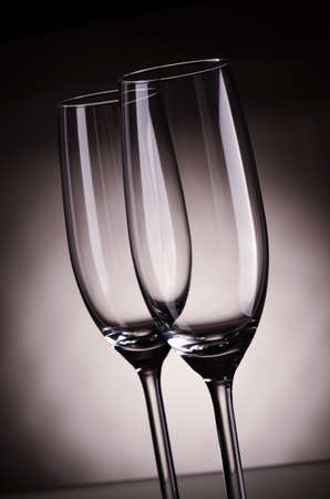 two empty champagne glasses on backgroundの写真素材