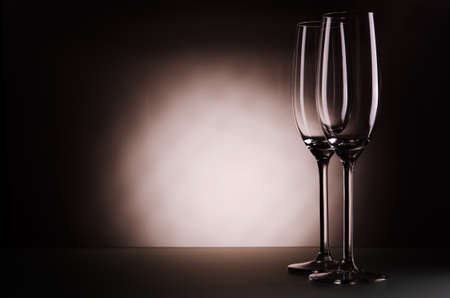 two empty champagne glasses on backgroundの写真素材