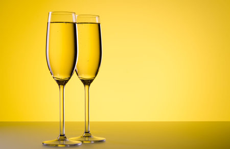 glasses of champagne on backgroundの写真素材