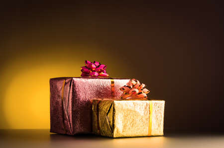 gift boxes on yellow backgroundの写真素材