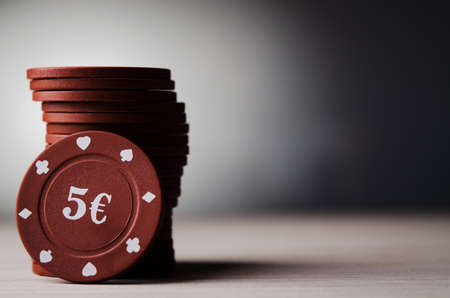 red poker chips on a backgroundの写真素材