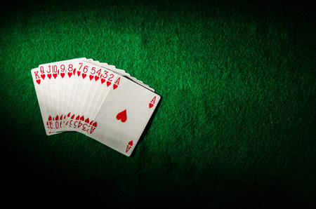 set of cards on a poker table