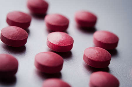 close up of red tablets の写真素材
