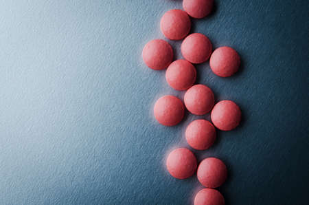 red medical drugs on backgroundの写真素材