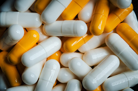 close up of yellow and white capsuleの写真素材