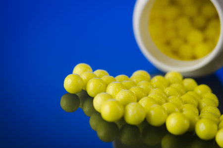 close up of vitamins on background