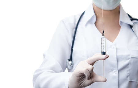 woman doctor holding syringe with drug isolated on white backgroundの写真素材