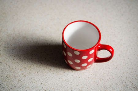 empty red cup for coffeeの写真素材