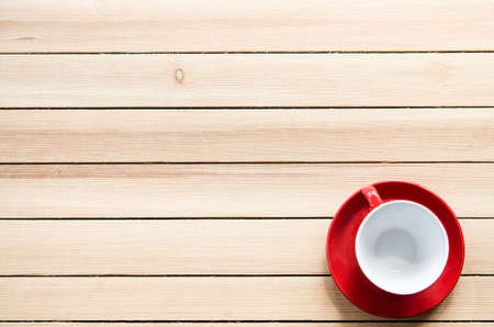 empty red coffee cup on backgroundの写真素材
