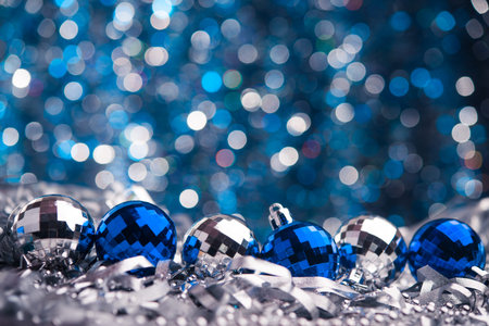 Merry Christmas background. Blue glass toys