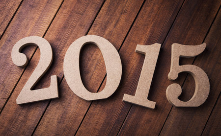 wooden numbers 2015 on background