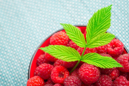 fresh red raspberry in a plate